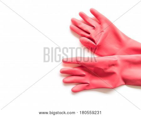 Closeup Red rubber gloves for cleaning on white background workhouse concept