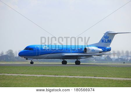 Amsterdam the Netherlands - April 2nd 2017: PH-KZP KLM Cityhopper Fokker F70 takeoff from Polderbaan runway Amsterdam Airport Schiphol