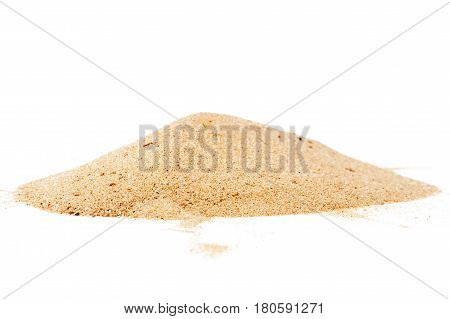 Pile of yellow sand isolated on white background selective focus at front