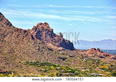 The Praying Monk rock formation on the north side of Camelback Mountain in Phoenix Arizona viewed from helicopter
