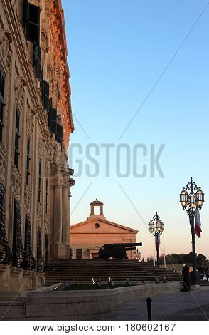 auberge de castille in evening light at sunset