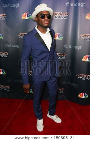 NEW YORK-AUG 12: Singer Omi attends the 'America's Got Talent' Season 10 Results Show at Radio City Music Hall on August 12, 2015 in New York City.