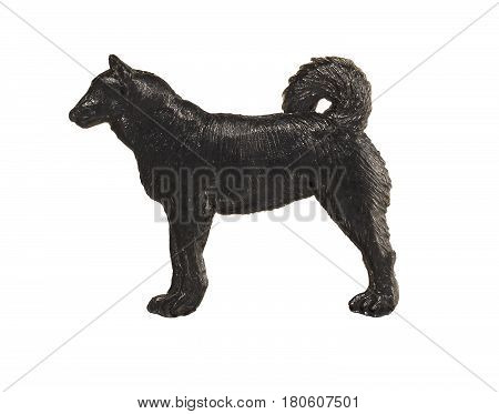 Black dog figure on white background, Laika.