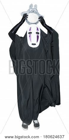 a woman in a black veil and face mask isolated on white background