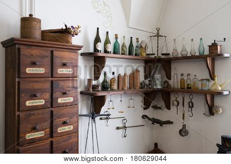 Grodno, Belarus - April 5, 2017: Shelf With Medieval Drugs And Old Apothecary Cabinet In The Pharmac