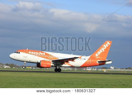 Amsterdam the Netherlands - April 7th 2017: G-EZFO easyJet Airbus A319-100 takeoff from Polderbaan runway Amsterdam Airport Schiphol