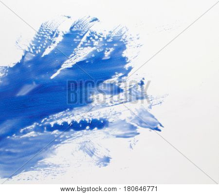Creative abstract art, modern painting. Smeared blue color strokes on white background, water, stream. Abstractionism, creativity
