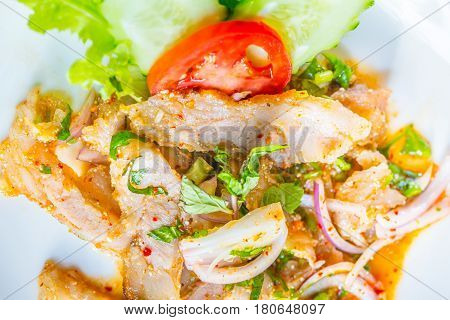Hot And Spicy Thai Food, Pork Nam-tok Or Chili Sour Mix.