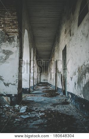 Corridor old building. Long corridor with doors in the old building
