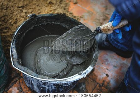 Work with cemet, Trowel, cement and bucket