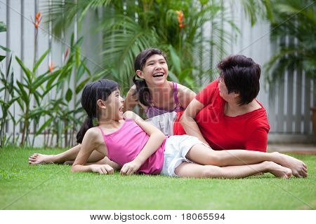 Happy Asian Mother And Daughter Having Fun Outdoor