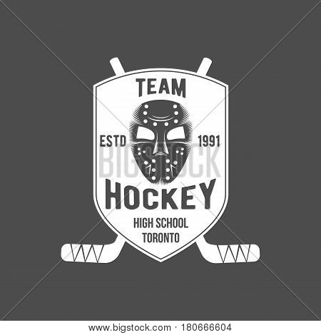 Ice hockey labels and design elements. The emblem with goalkeeper helmet, hockey pucks, sticks, protective masks , heraldic shields, wreaths, ribbon banners. Vintage Badge Logo Template