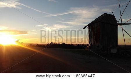 Sunset at a disused windmill in Portuguese village of Avacasta