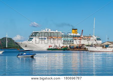 Victoria Mahe Island Seychelles - December 16 2015: Costa Neoromantica Cruise ship anchored at Victoria port Mahe Island Seychelles Indian Ocean Eastern Africa.