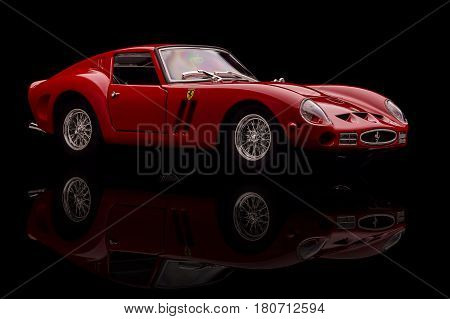 KRIVOY ROG, UKRAINE - OCT 29 - Toy Ferrari 250 GTO on background. Photo made in the studio, Saturday 29 October 2016