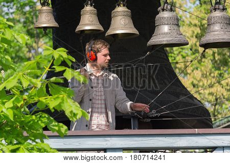 Kiev Ukraine - May 05 2016: Bell-ringer play on the set of bells of Holy Trinity Monastery of St. Jonas