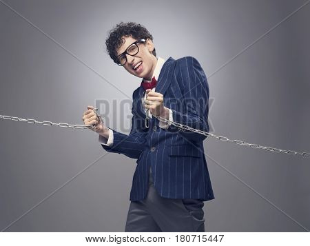 Businessman Breaking Chain