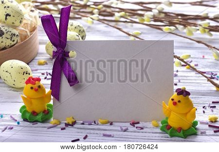 Easter Background With Yellow Easter Eggs Pussy Willow Branches Purple Ribbon And Little Chickens Sp