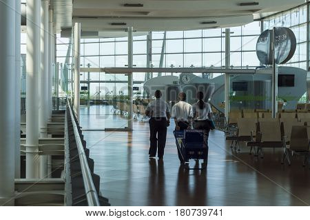 Madrid Spain: 24th July 2016: Airport staff is preparing for next fly. The Madrid-Barajas Airport is Spain's largest and busiest airport characterised by a floating roof propped by an internal coloured structure.
