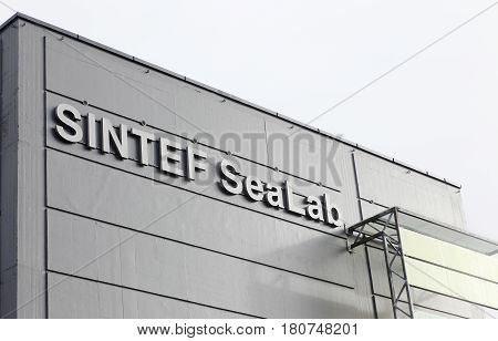 Trondheim Norway - September 30 2016: Exterior of the Sintef Sealab building with logo in Trondheim harbour Norway.