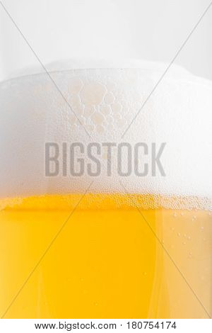 light lager beer in glass close up