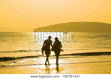 People on the beach in Ao Nang Krabi at sunset
