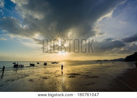 People on the beach in Ao Nang Krabi at sunset