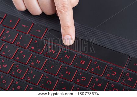 Finger Pushing Space Bar Button On Laptop Keyboard