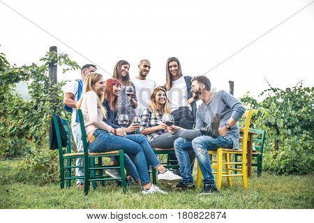 Group of friends at restaurant outdoors - People having dinner in a home garden