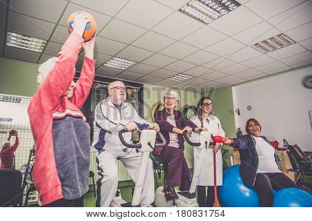 Senior adults in a nursing home for the elderly doing sport activities