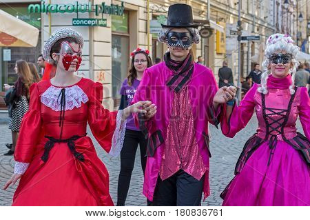 TIMISOARA ROMANIA - MARCH 31 2017: Young actors dressed in period costumes and present on the street inside the CheckART Carnival organized by the City Hall Timisoara.