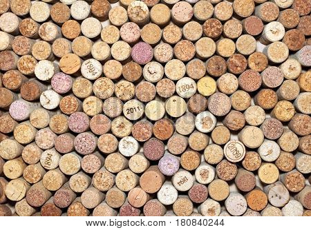 Wine corks background horizontal / used wine corks / many wine corks / closeup of a wall of used wine corks