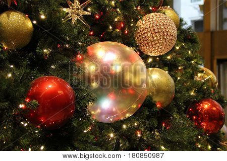 Christmas tree balls decorate the tree iside