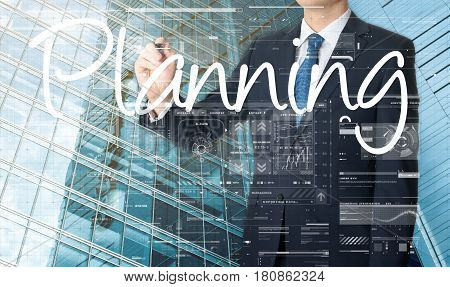 The Businessman Is Writing Planning On The Transparent Board With Some Diagrams And Infocharts With