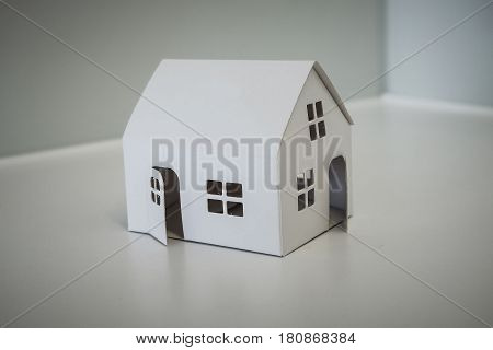 White Paper House with windows and open doors