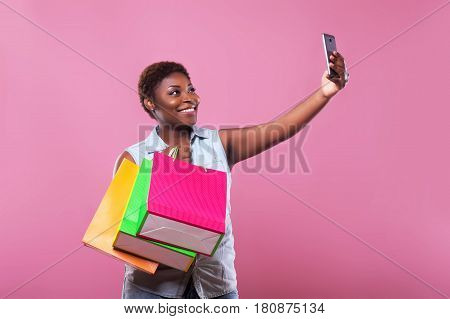 selfie African American on pink the background