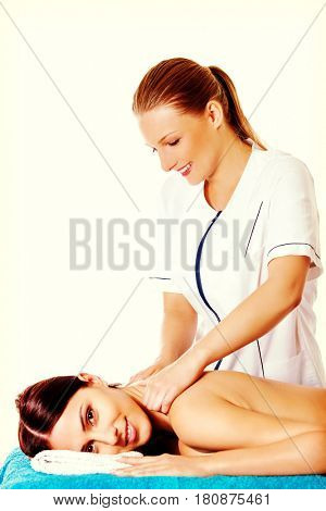 Woman having massage of body in the spa salon. Beauty treatment concept.