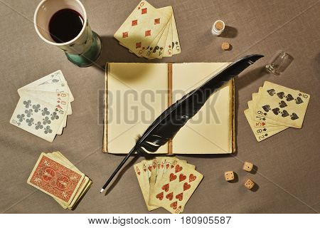 MOSCOW, RUSSIA - APRIL 10, 2017: Poker cards lying around the book for checking results
