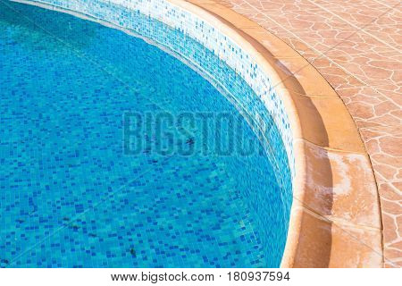 old swimming pool in hotel with blue water