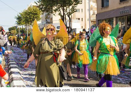 LIMASSOL, CYPRUS - FEBRUARY 26: Grand Carnival Parade - an unidentified people of all ages , gender and nationality in colorful costumes during the street carnival, February 26, 2017 in Limassol, Cyprus.