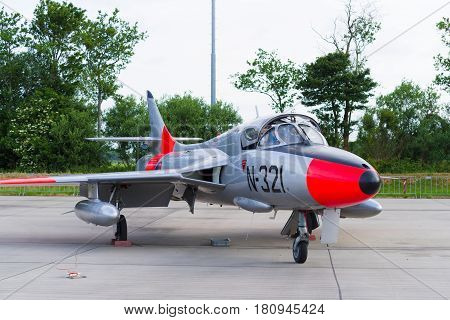 LEEUWARDEN NETHERLANDS - JUNI 10 2016: Hawker Hunter T.8C G-BWGL/N-321 fighter at the air force days in Leeuwarden