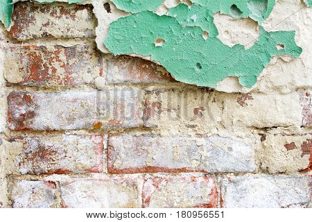 vintage background texture old masonry stone bricks on the ancient cement with cracks