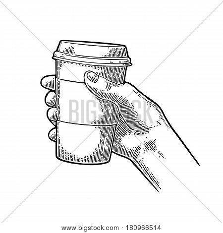 Hand holding a disposable cup of coffee with cardboard holder and cap. Vintage black vector engraving illustration for label web flayer. Isolated on white background