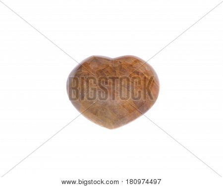 Golden healer quartz heart isolated on white background