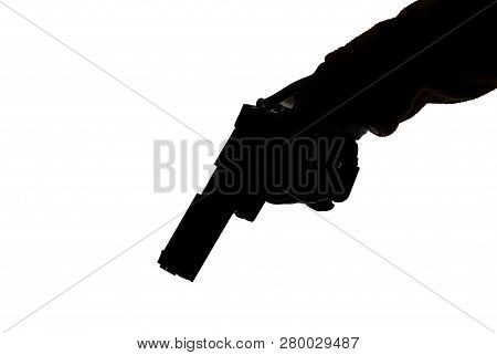 The Gun In The Hand Of Men Who Is Ready To Shoot At His Victim. Breaking The Law And Crime. Attack W