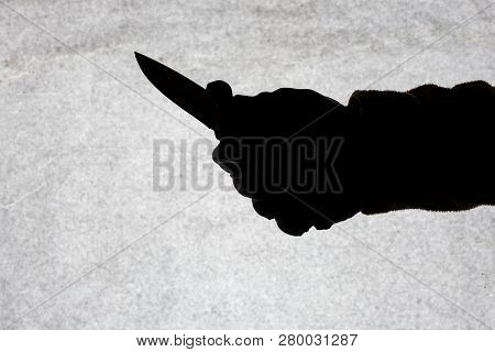 The Knife In The Hand Of Men Who Is Ready To Attack His Victim. Breaking The Law And Crime. Attack W