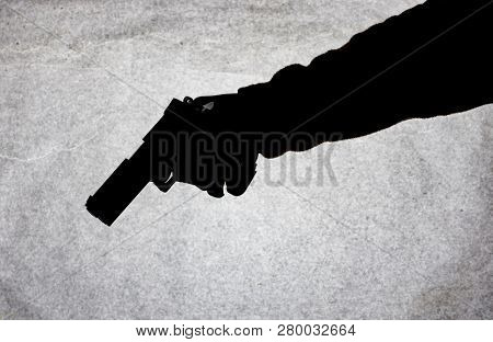 The Gun In The Hand Of Men Who Is Ready To Shoot At His Victim. Breaking The Law And Crime. Attack W