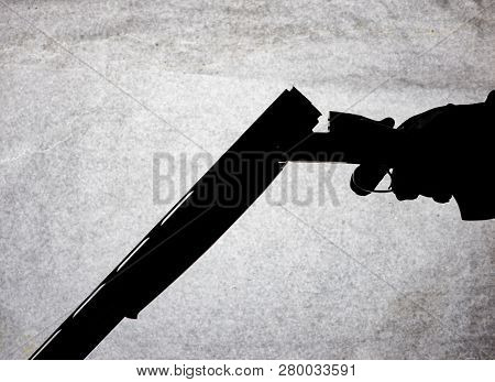 Classic Double-barrell Smooth-bore Hunting Rifle Isolated On White Background In Man Hand