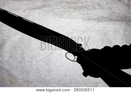 Classic Double-barrell Smooth-bore Hunting Rifle Isolated On White Background In Man Hand