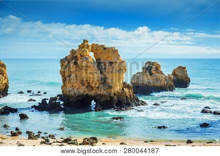 Rocks In Blue Ocean In Sunny Day, Algrave, Portugal